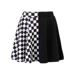 Jupe courte à carreaux noir et blanc avec chaînes